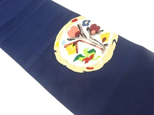 本綴れ丸文に抽象花鳥模様織り出し名古屋帯